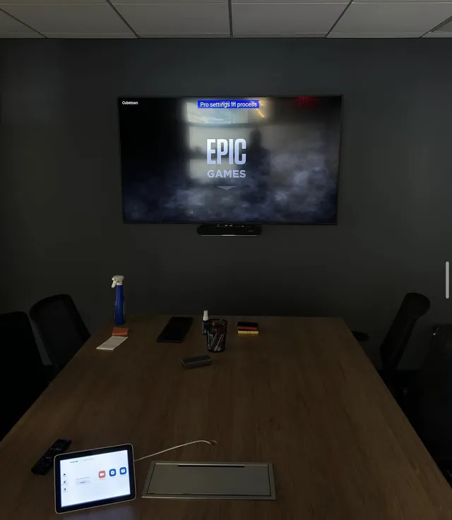 Conference room with wall display and table touch panel