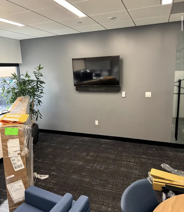 Wall-mounted display in an open office area