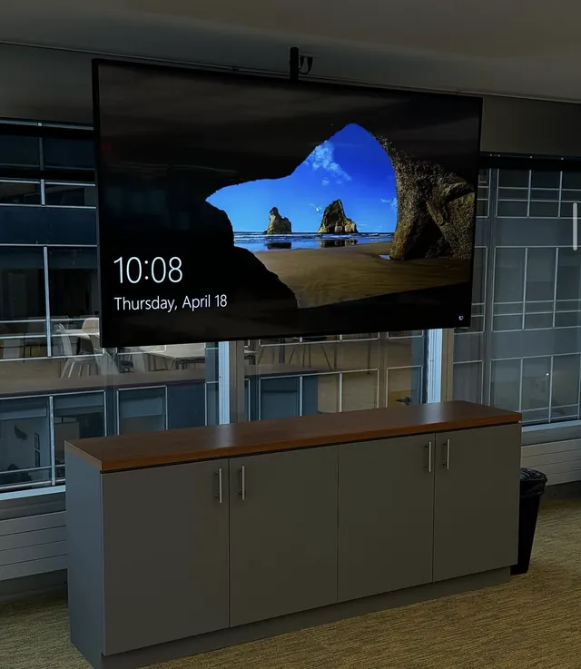 Commercial display mounted above a credenza